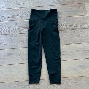 SPANX dark green booty boost side pocket leggings 7/8 length